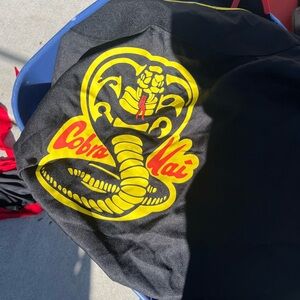 Cobra Kai costume Halloween Sz 36 -38
Unisex new with tags Martial arts